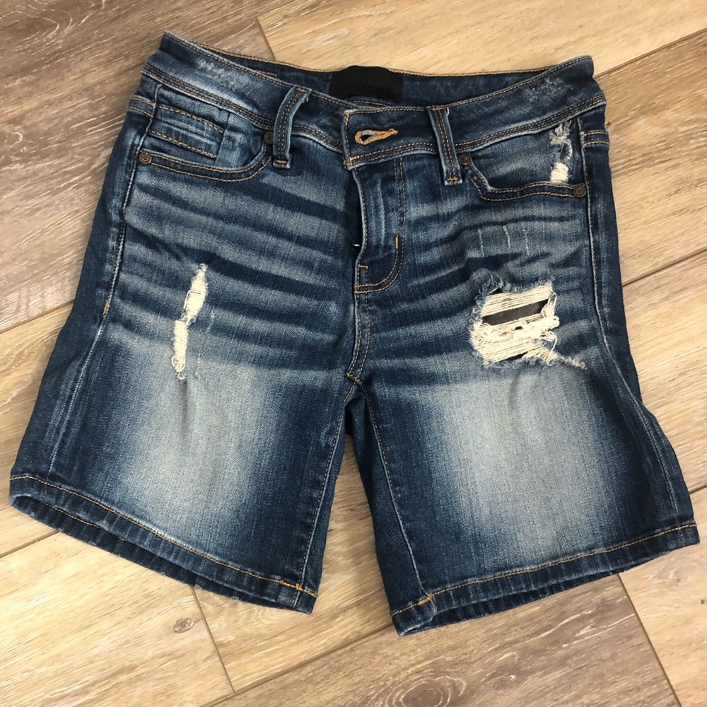 Distressed denim shorts